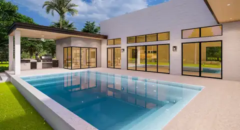 Piscine moderne avec eau cristalline devant une maison contemporaine
